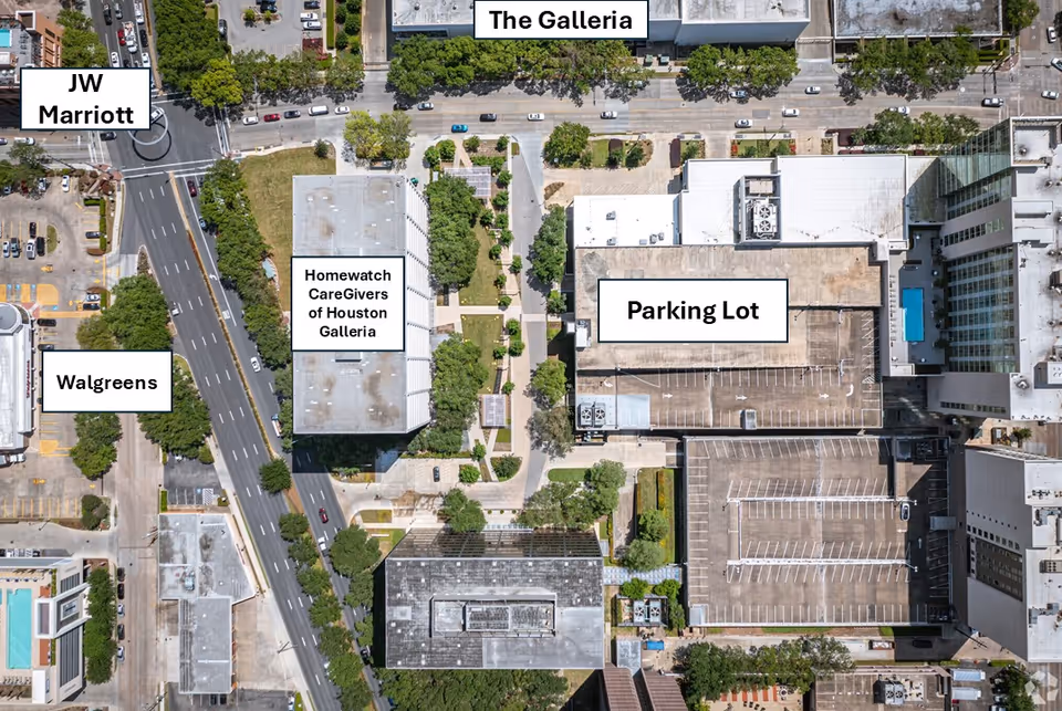Aerial view of Homewatch CareGivers of Houston Galleria building and surrounding parking.