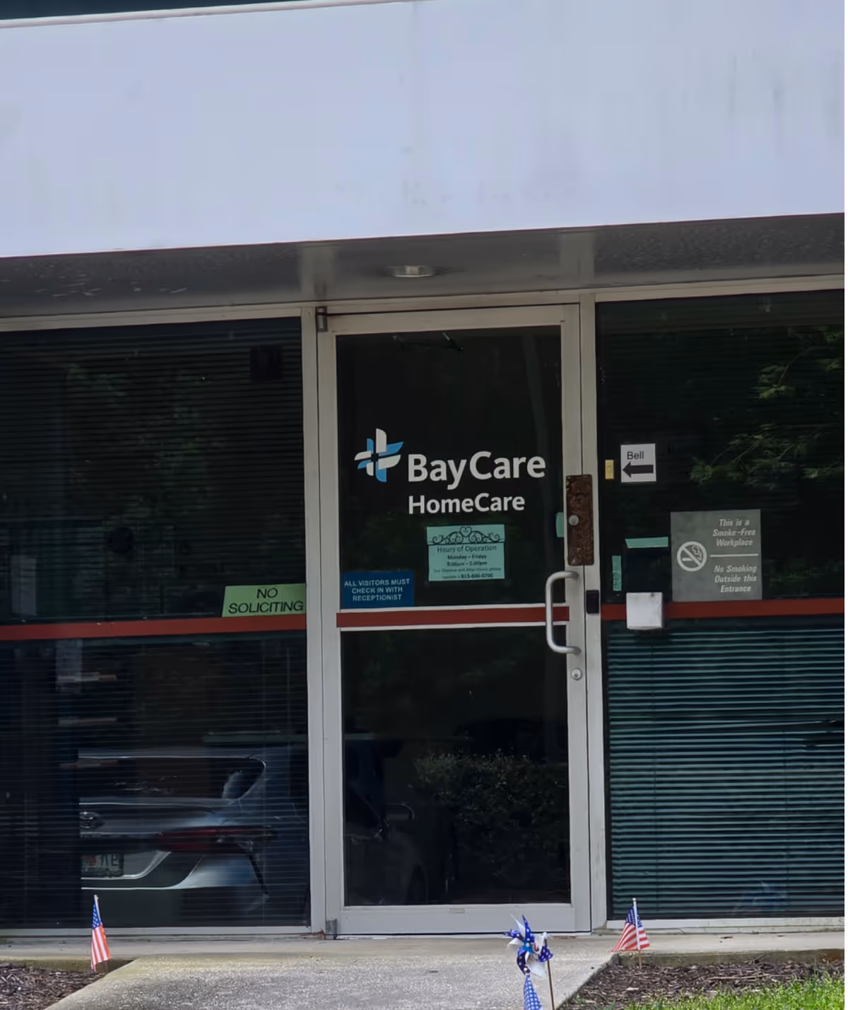 BayCare HomeCare logo on glass doors at building entrance.