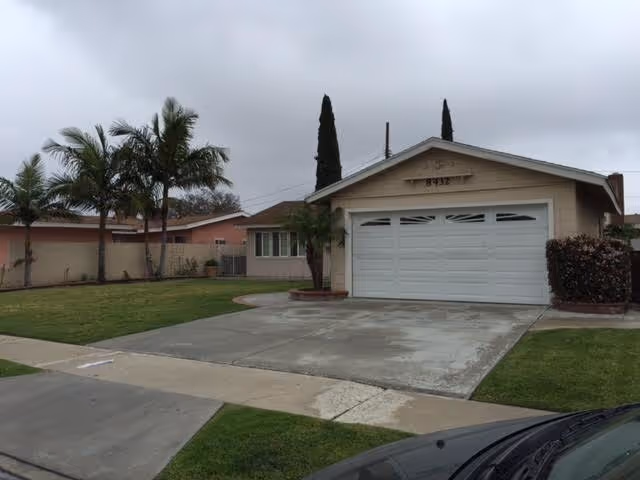 Front exterior of a single-story Buena Park Guest Home with a two-car garage.