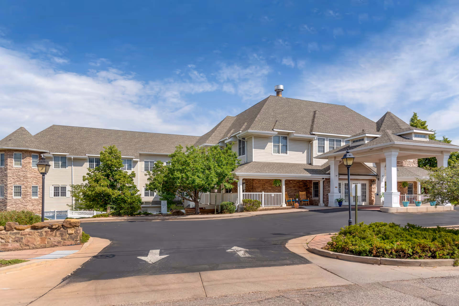 Exterior view of Brookdale Monument Valley Park senior living facility entrance.
