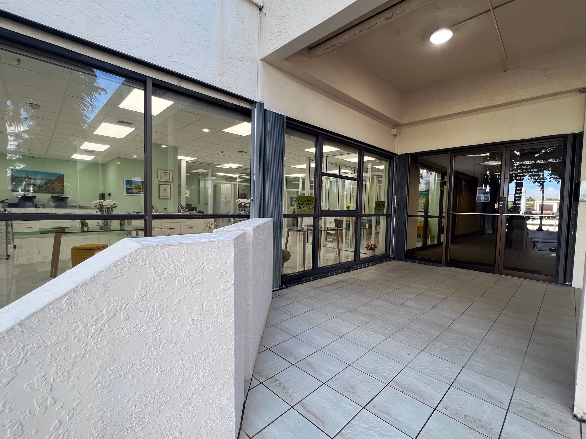 Entrance to Beatriz Home Health Care with glass doors and a visible lobby.