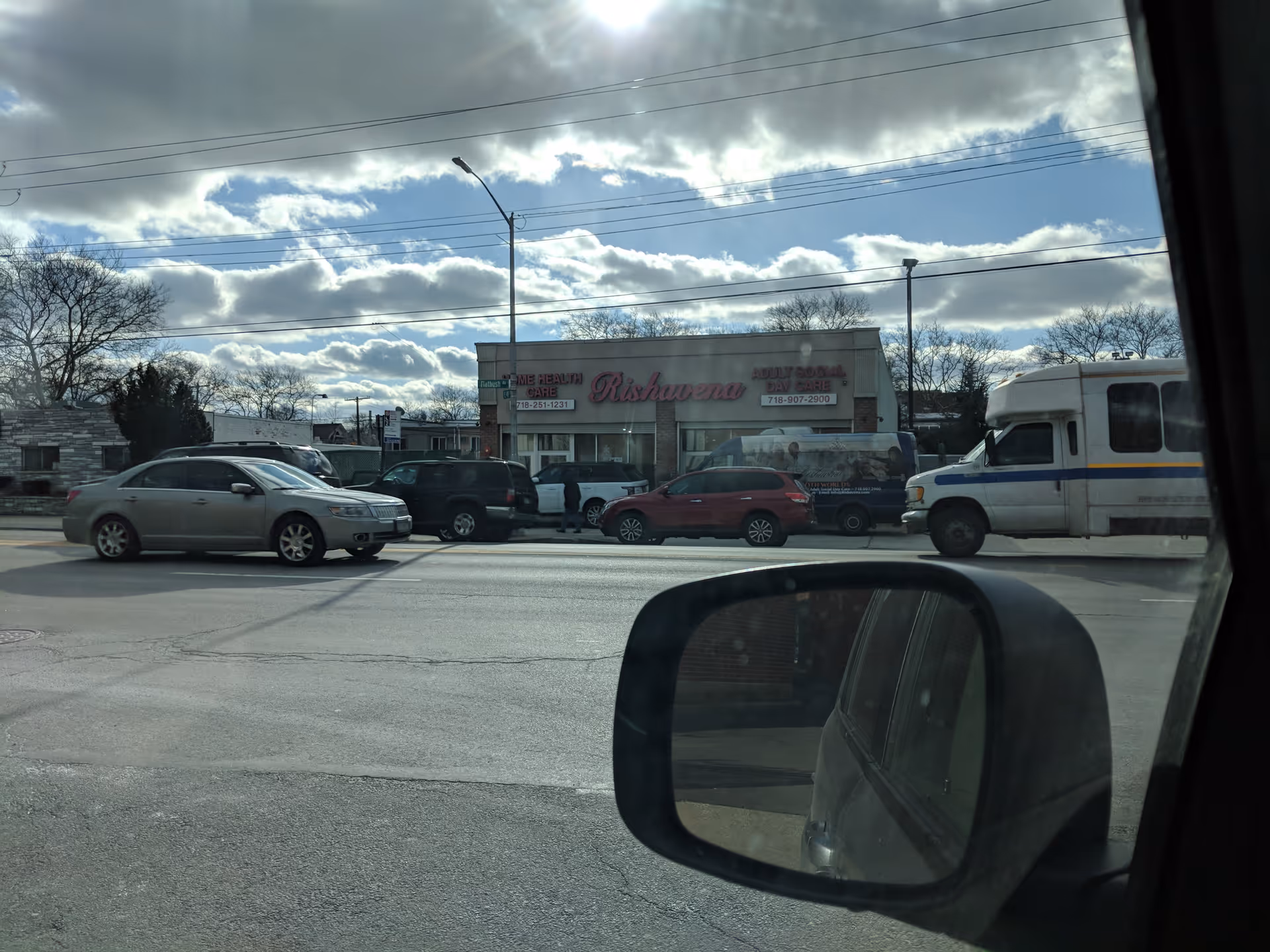 Exterior view of Rishavena Home Health Care and Adult Social Daycare building across street