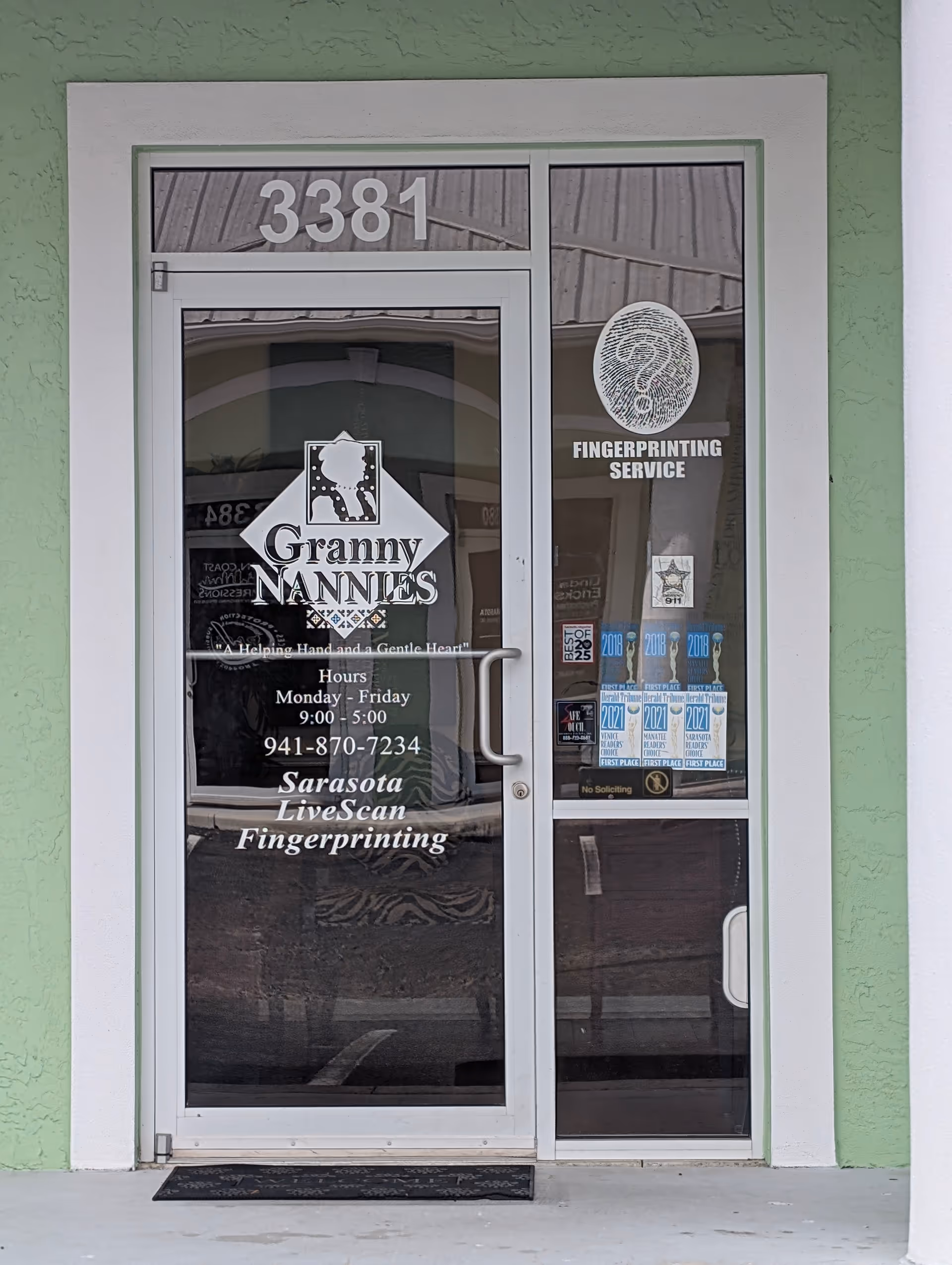 Front entrance of Granny Nannies Senior Home Care of Sarasota with glass doors and signage