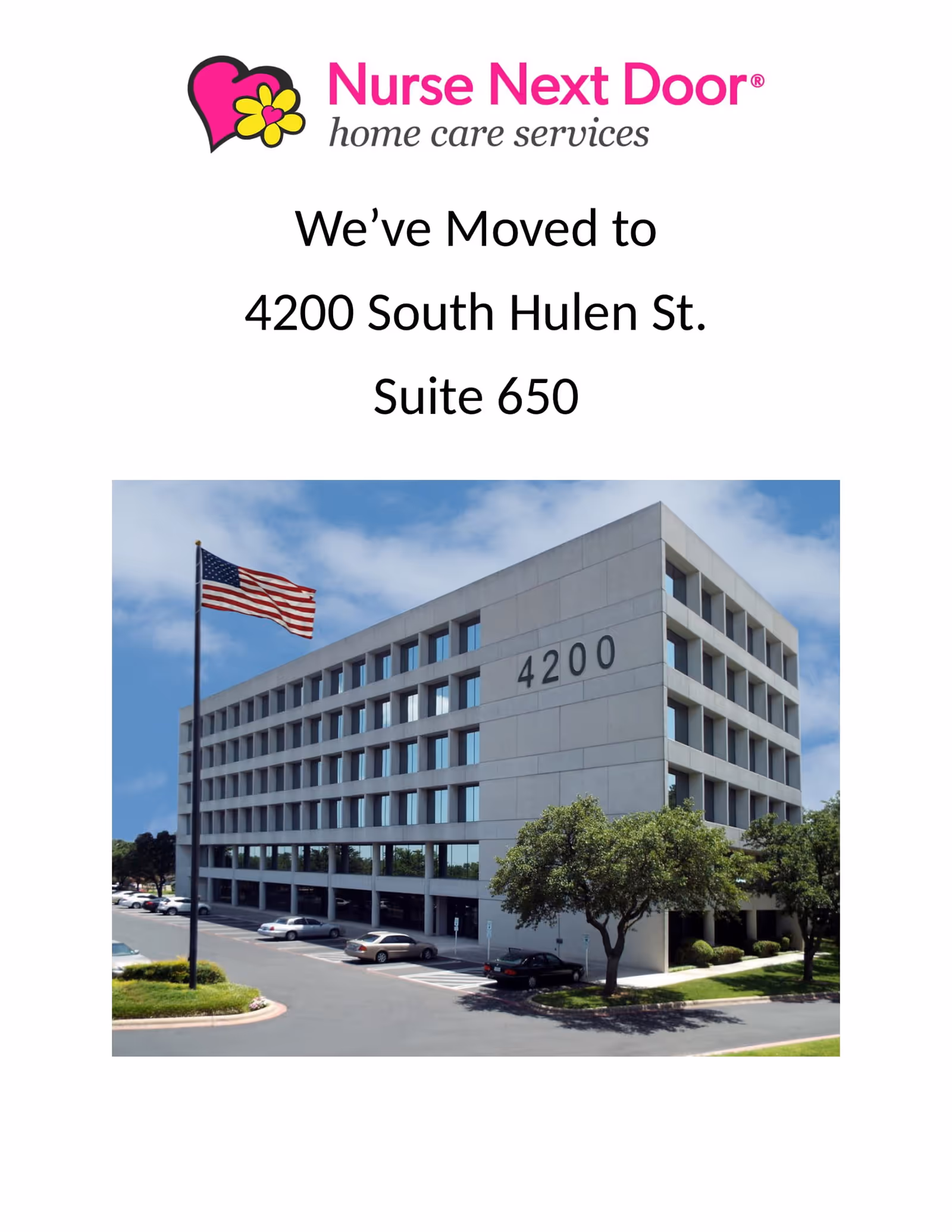 Exterior view of a modern office building with address 4200, trees, flag, and parked cars.
