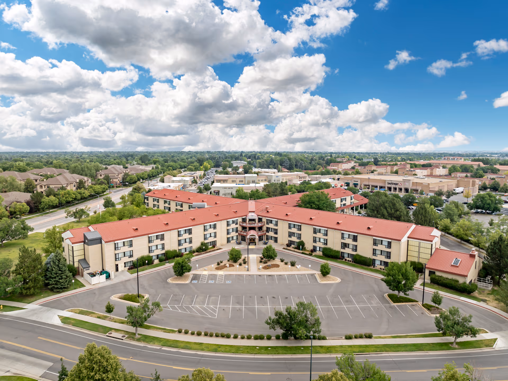 Aerial view of Brookdale Lowry with red-roofed buildings and surrounding parking.