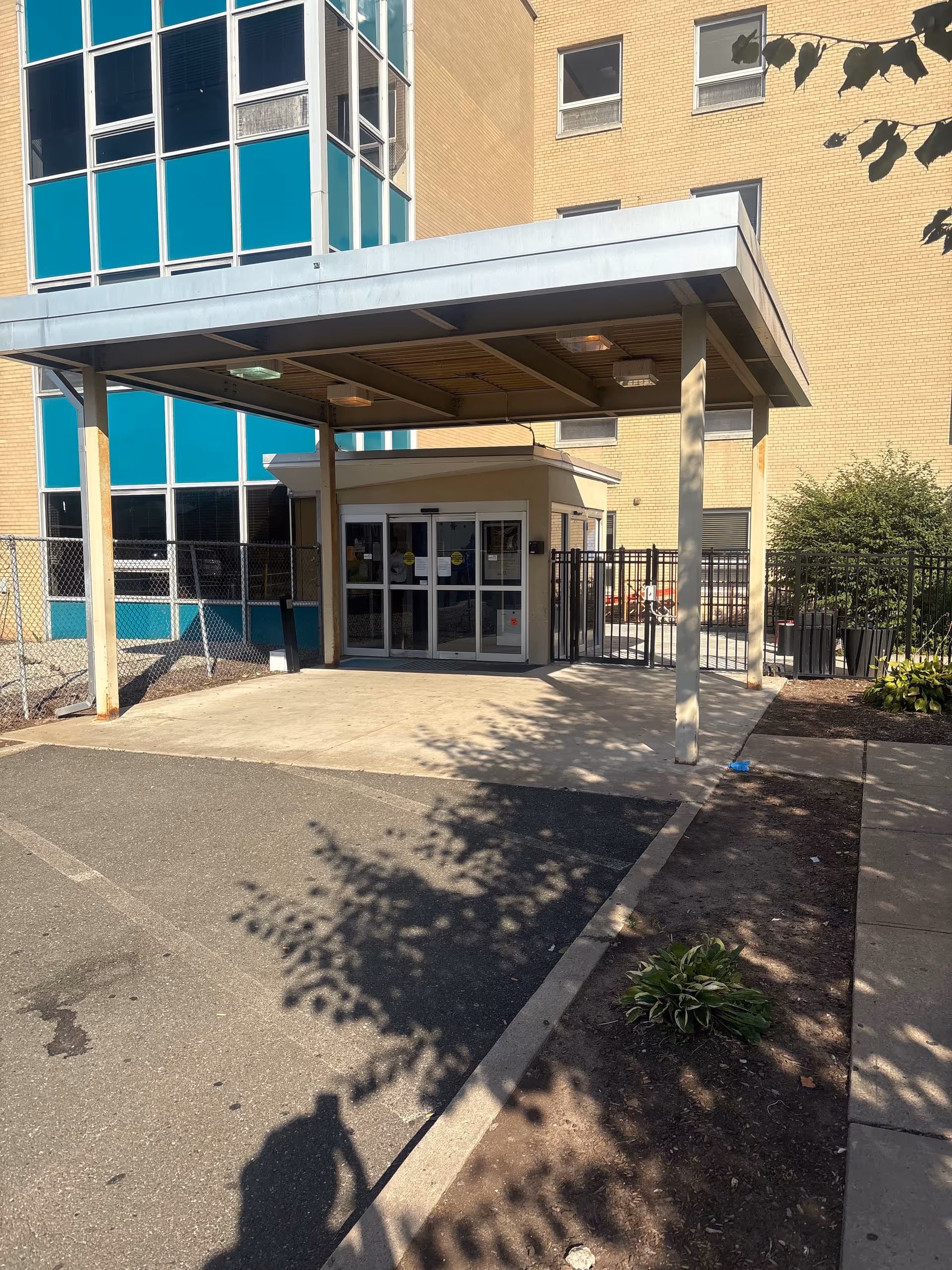 Exterior view of the Alaris Health at St. Mary's entrance under a canopy.