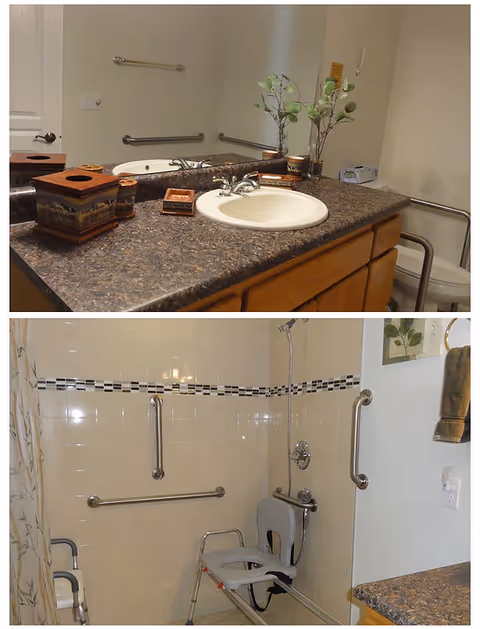 Granite bathroom counter with sink and accessibility features; tiled accessible shower.