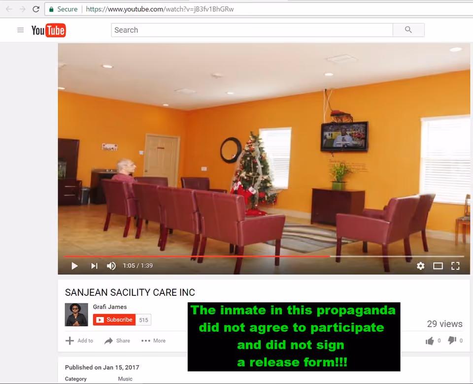 Orange-walled senior living lounge with red chairs, a Christmas tree, and a TV.