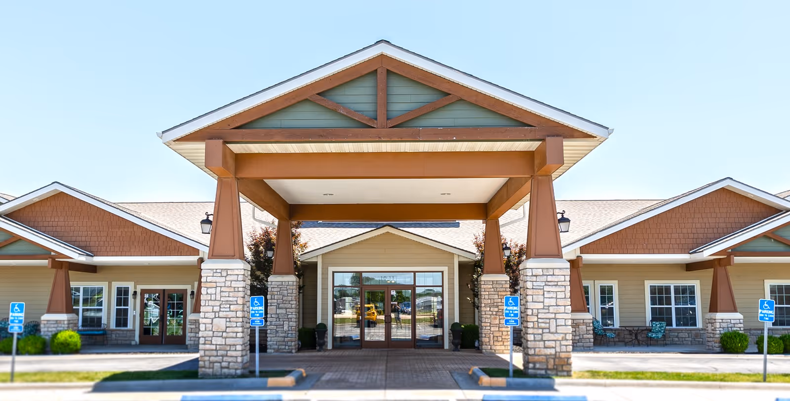 Front entrance of Oak Pointe of Monett senior living facility with covered entry.