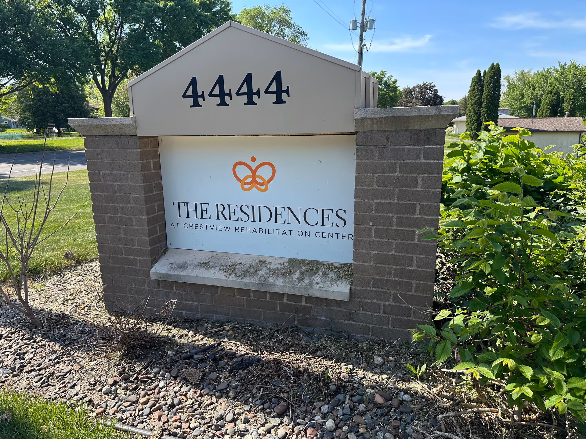 Outdoor brick sign displays 4444 and The Residences at Crestview Rehabilitation Center