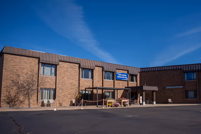 Exterior view of Aspirus Care & Rehab - Medford building entrance with brick facade