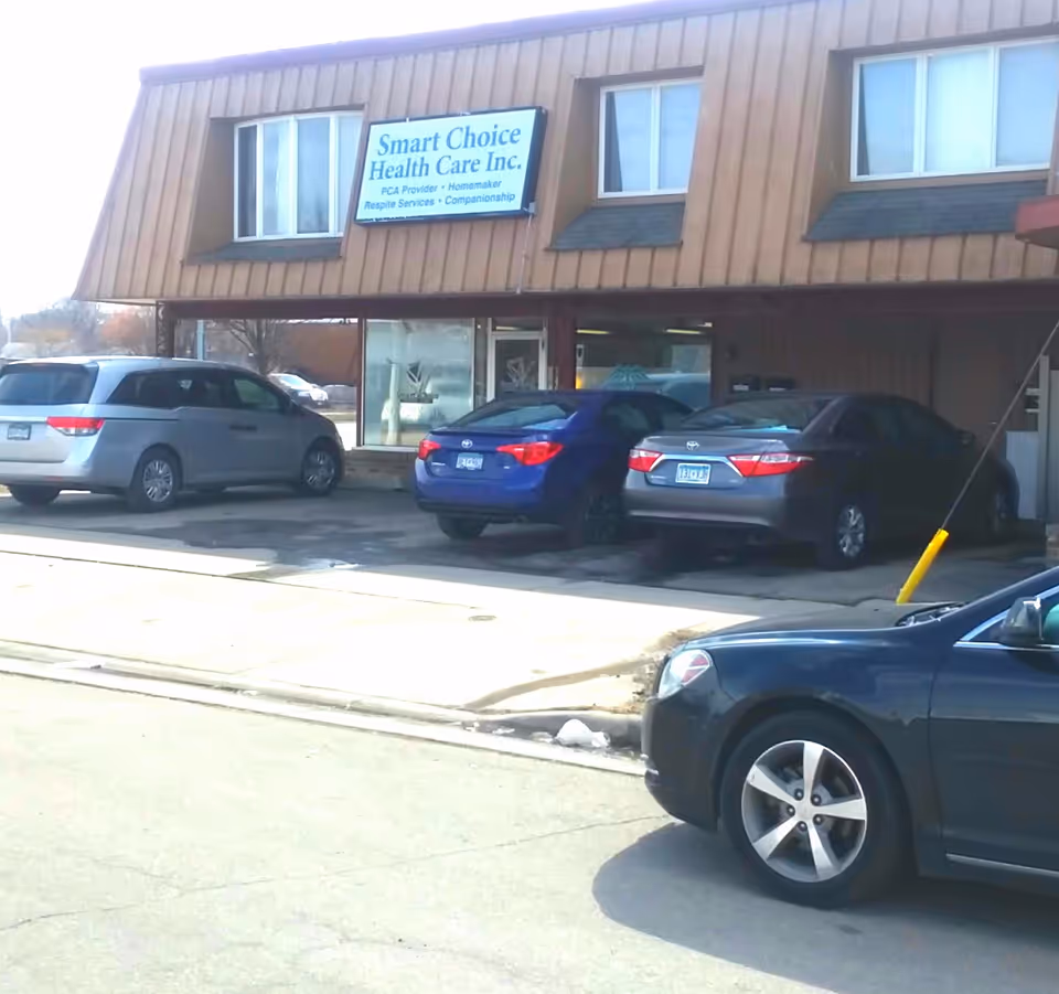 Exterior view of Smart Choice Health Care building with parked cars in front