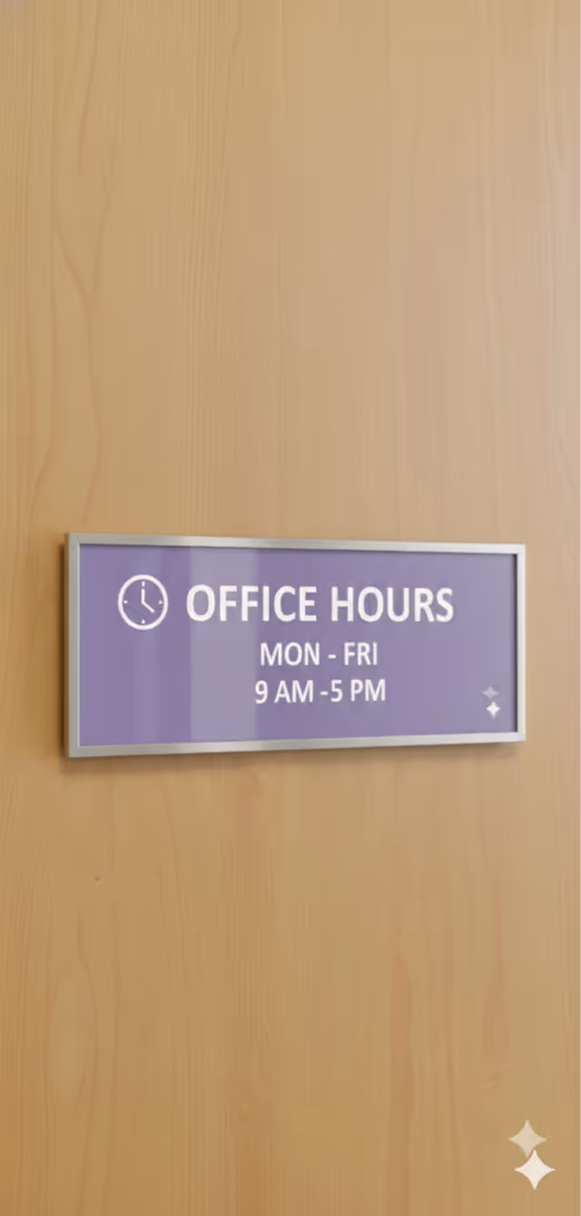 Purple office hours sign mounted on a wooden interior wall.