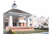Exterior view of Citizens Care & Rehabilitation Center with entrance and sign.