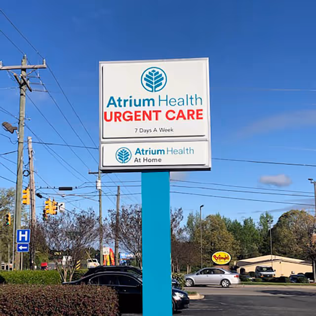 Outdoor sign for Atrium Health Urgent Care and At Home services