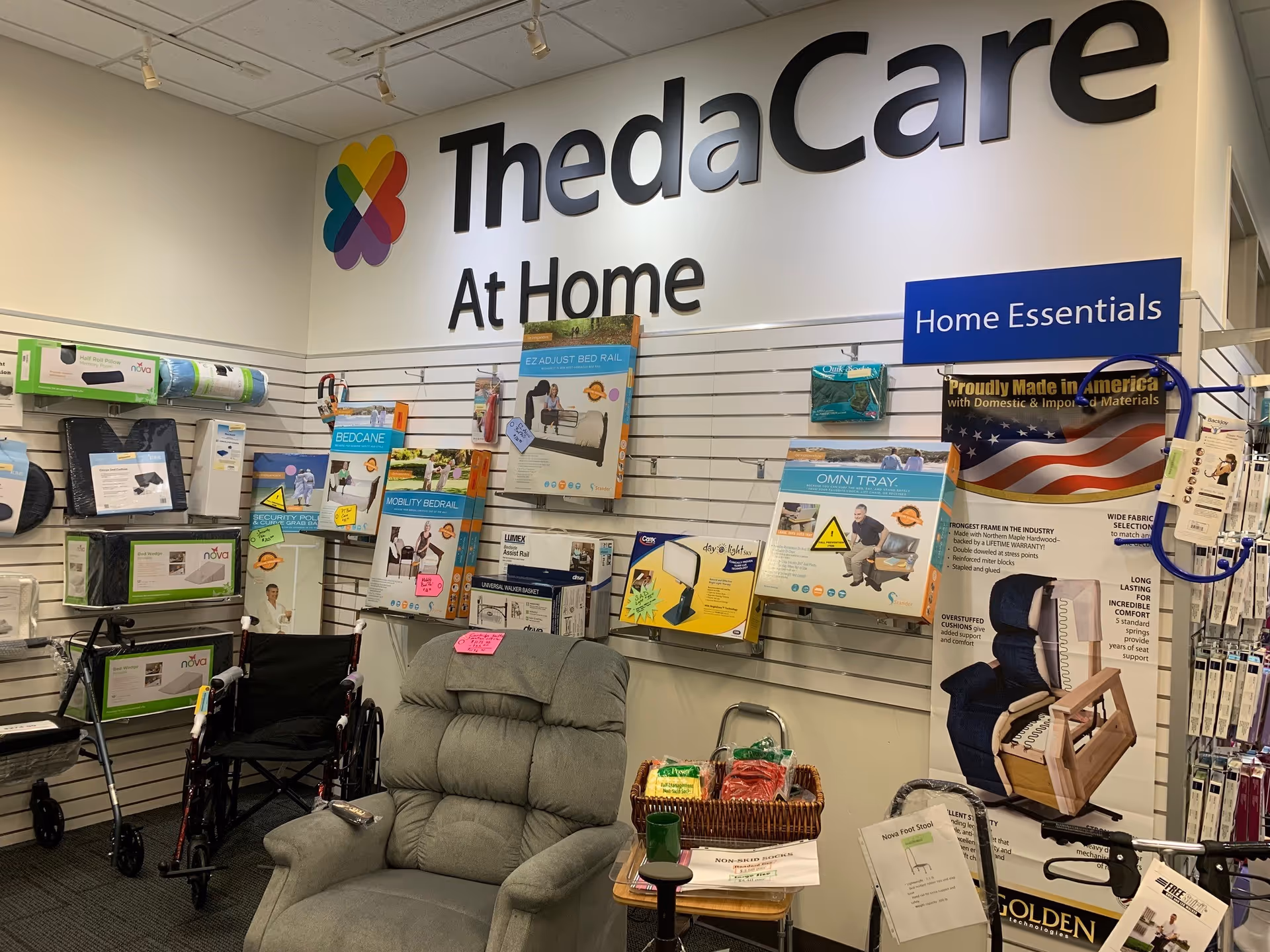 Indoor showroom with ThedaCare At Home signage and medical equipment displays.