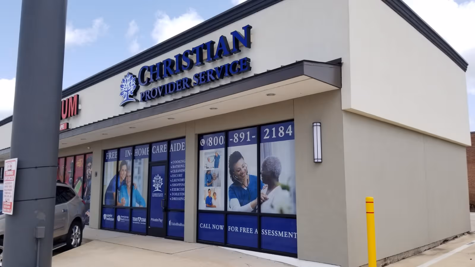 Exterior of Christian Provider Service facility with blue storefront windows.