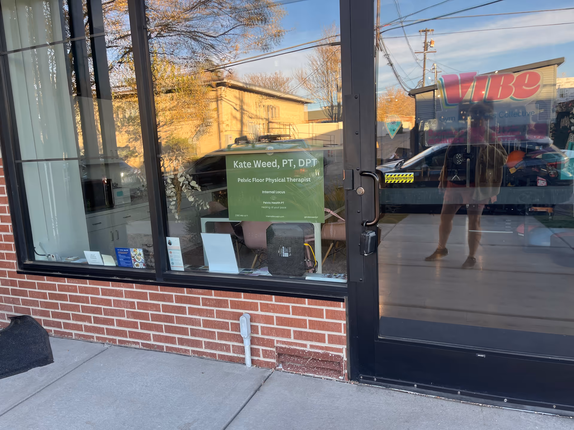 Exterior storefront with window sign for Internal Locus Pelvic Health Physical Therapy