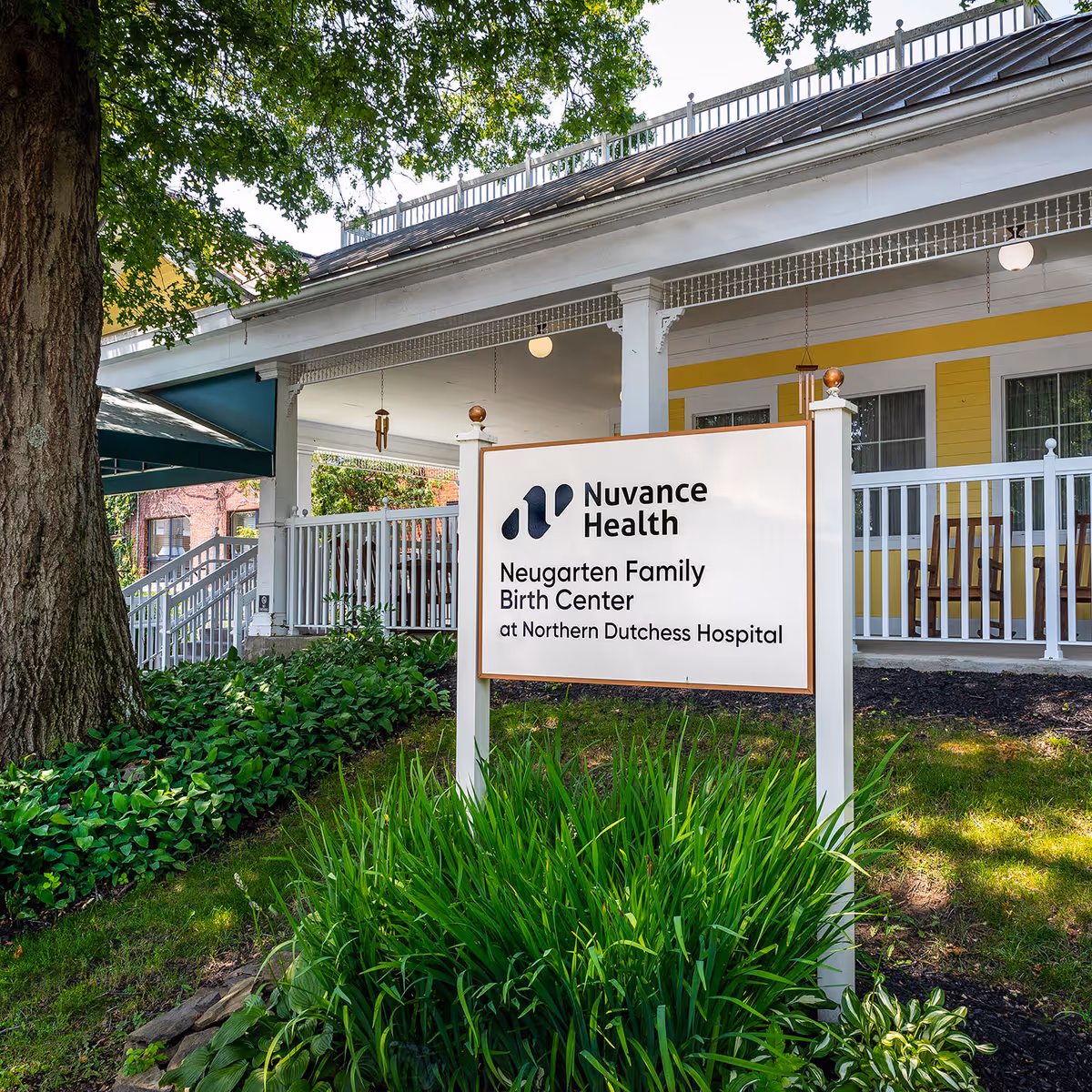 Exterior view of a building with a sign for Nuvance Health Birth Center.