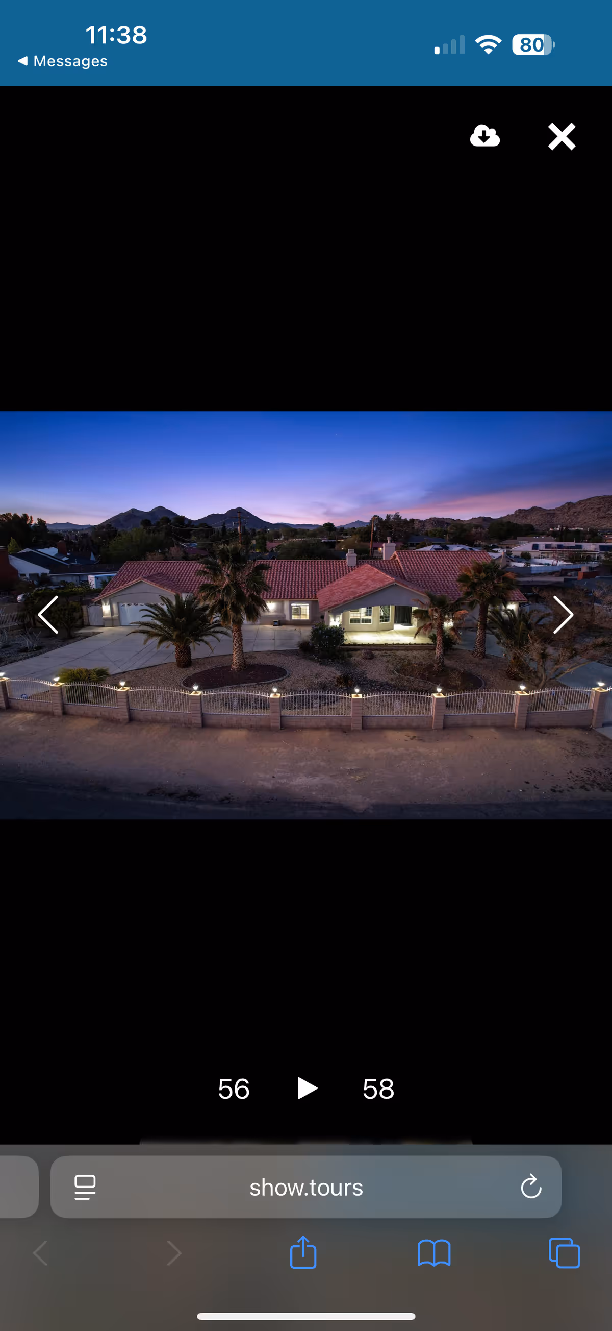 Twilight exterior of a Country Club Care facility with palm trees and a lit front yard.