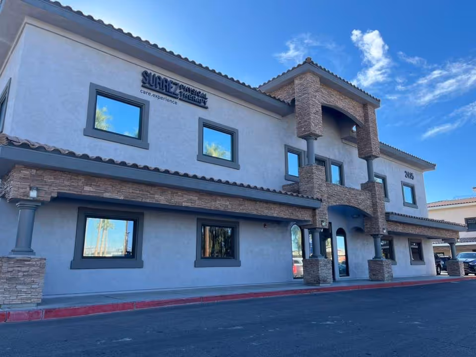 Exterior of Family Personal Care LLC building, two-story with stone columns.