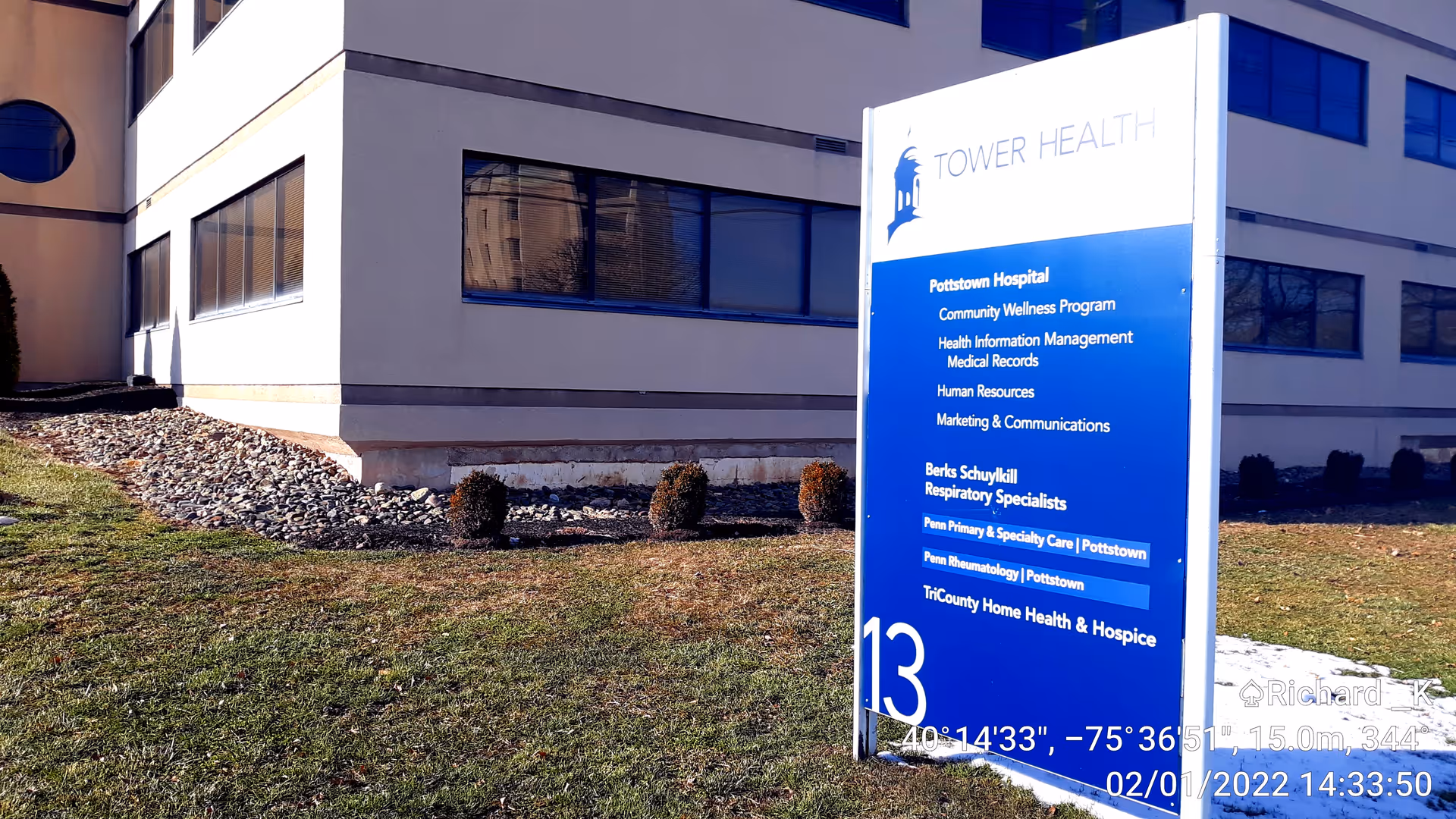 Exterior view of a building with a tall blue sign for TriCounty Home Health.