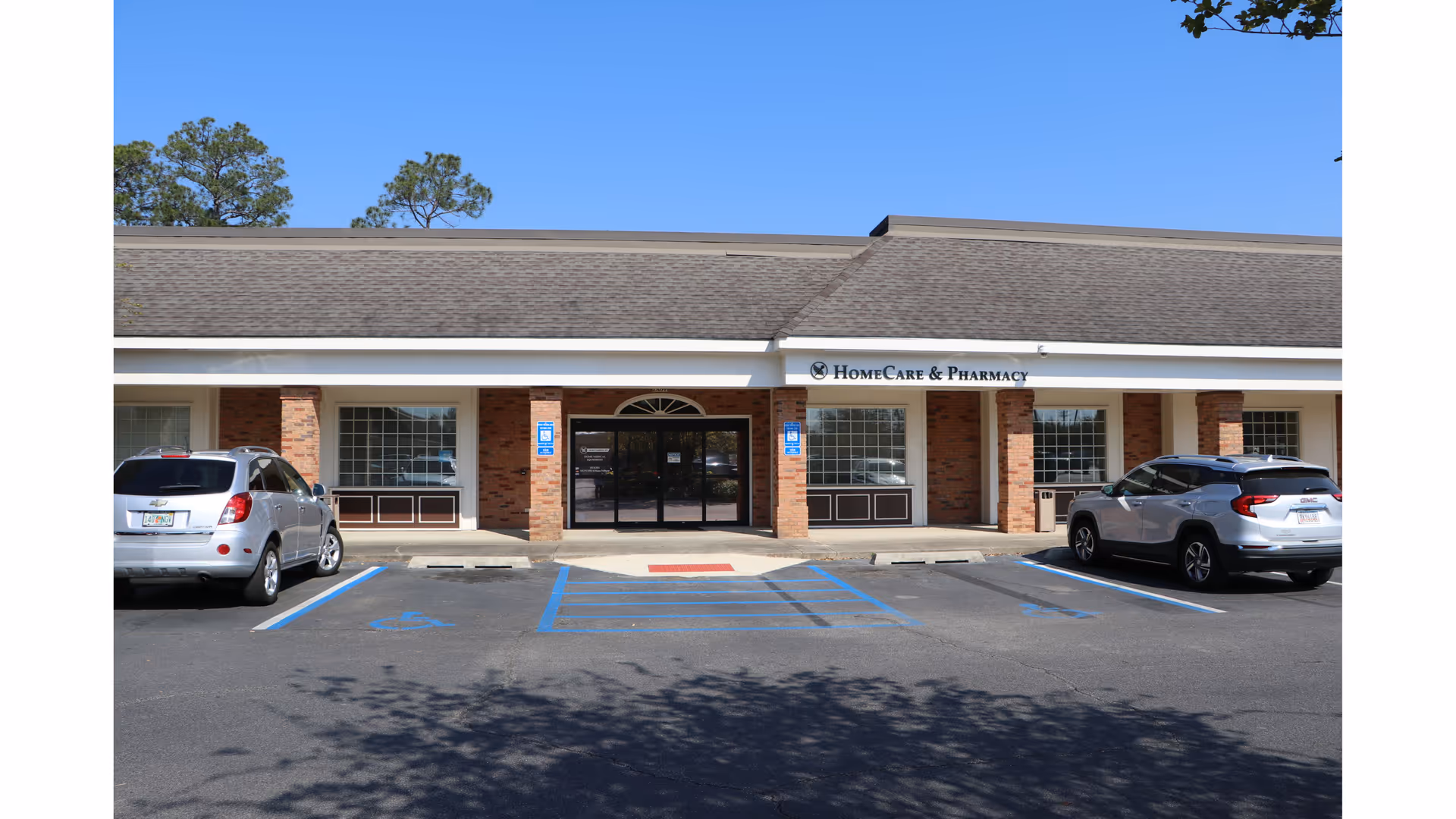 Front view of Archbold Home Care Center with brick facade, parking spaces, and entrance.