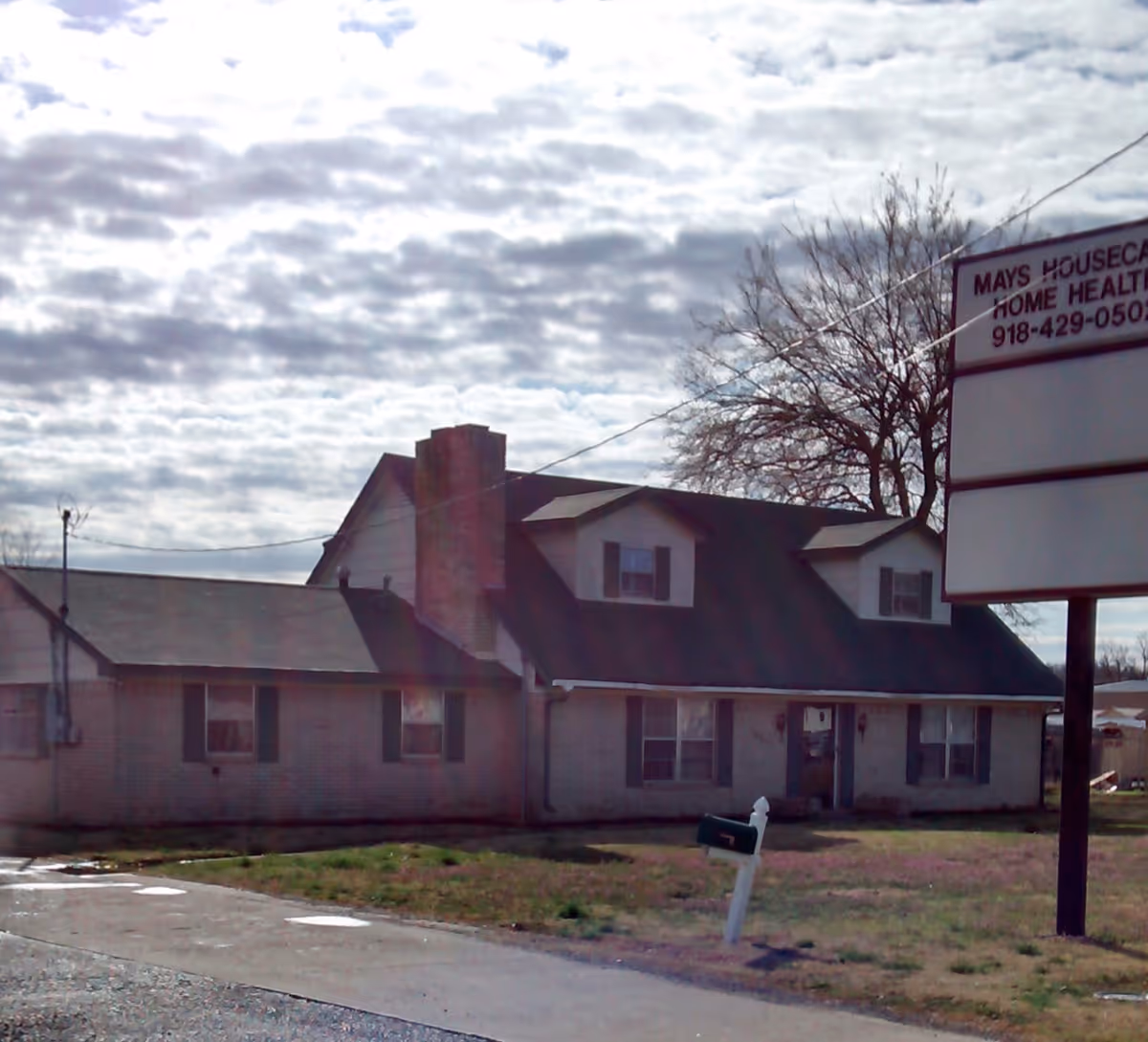 Front exterior of a single story building with a sign for Mays Housecall Home Health.