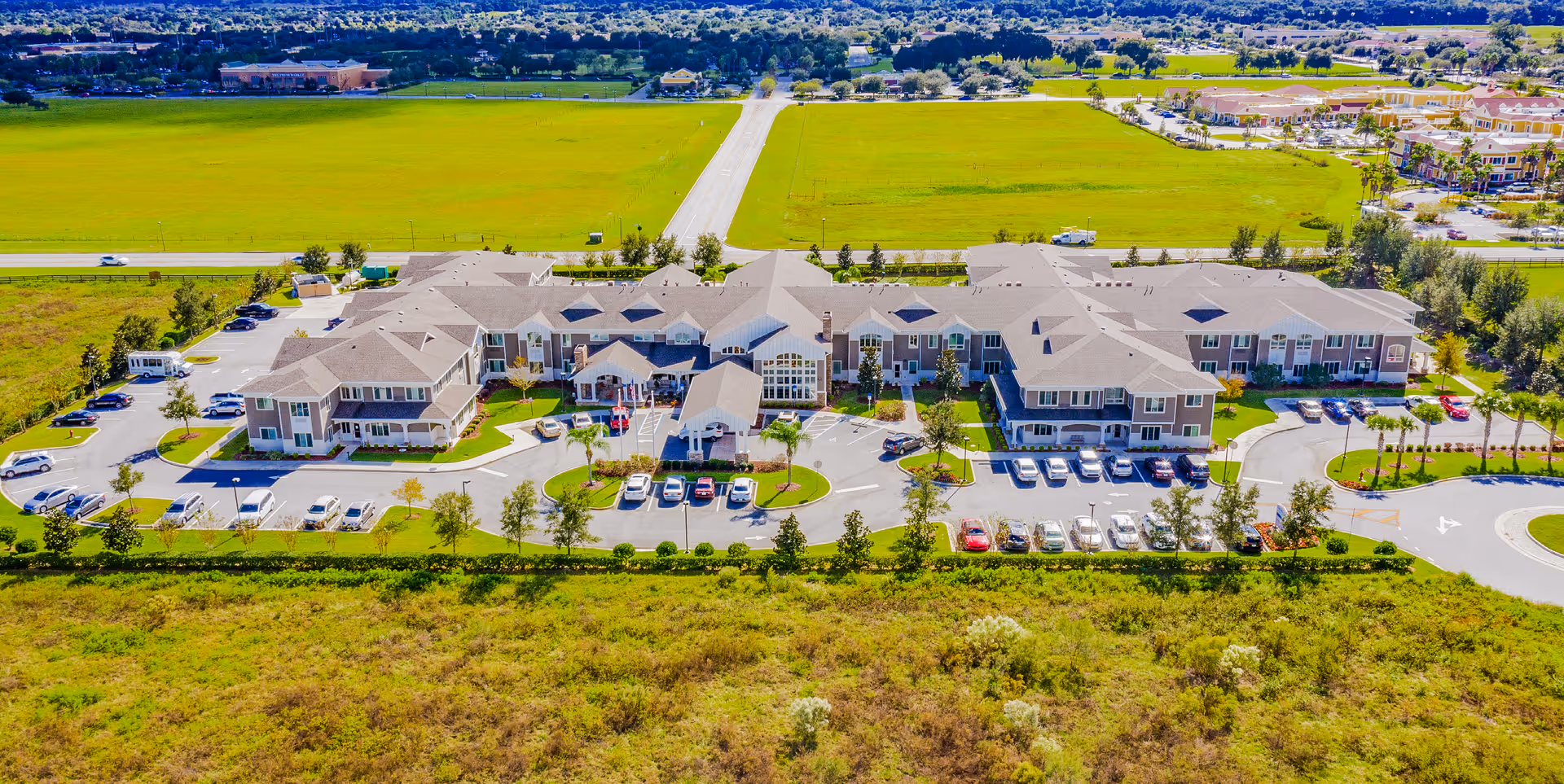 A large senior living campus named The Willows, with connected buildings and parking.