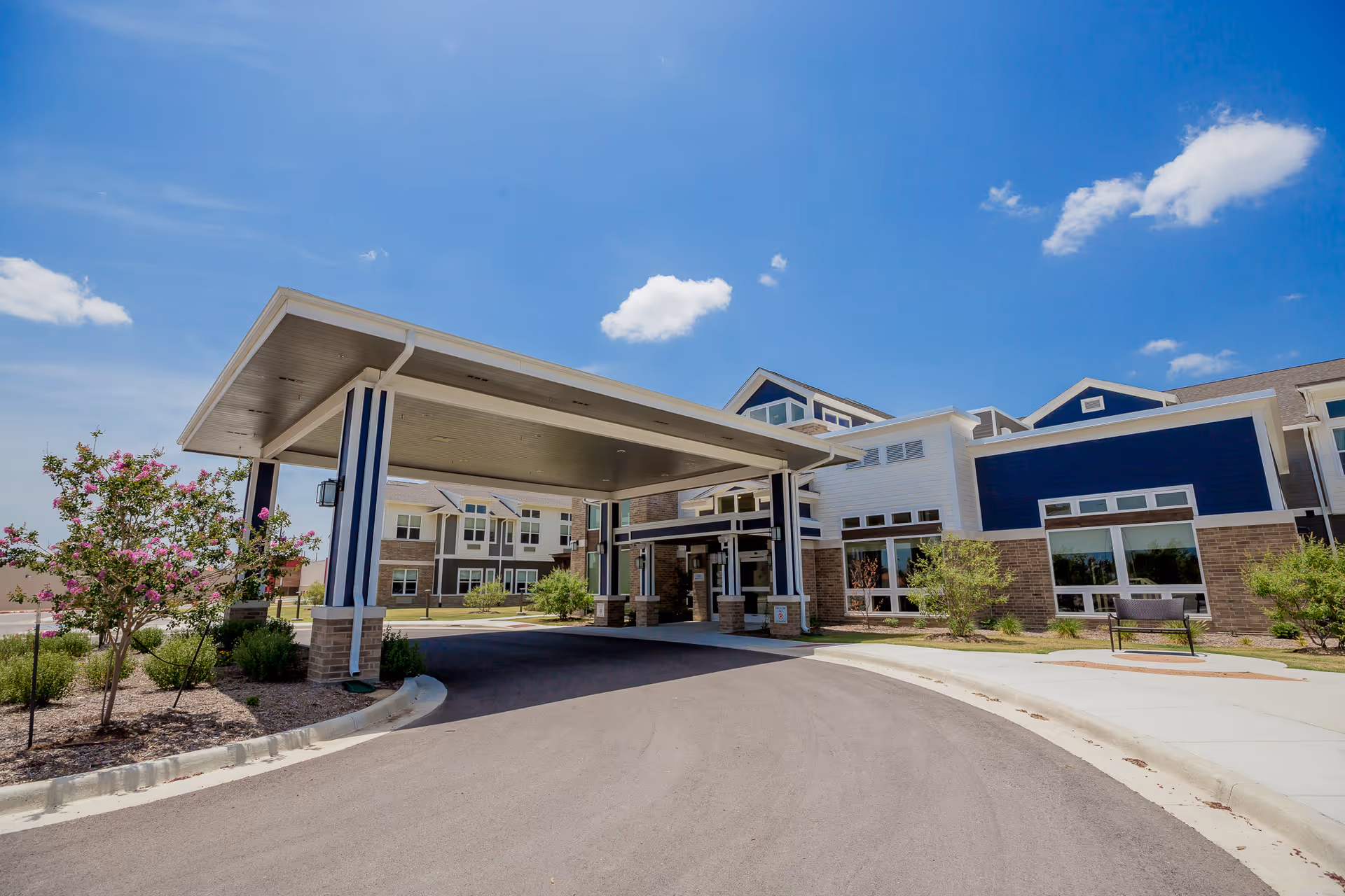 Exterior view of Ignite Medical Resort Fort Worth with a covered entrance.