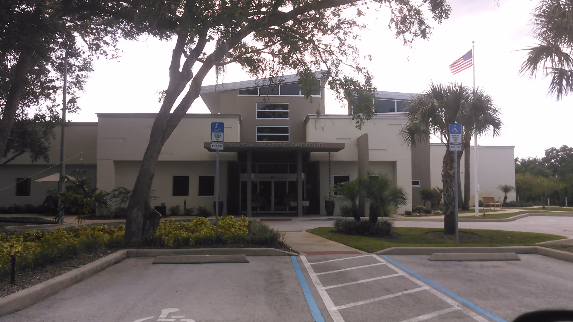 Front of St. Francis Hospice Care Center with accessible parking.
