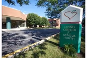 Exterior view of Finger Lakes Health Living Center at Geneva North with sign and entrance.