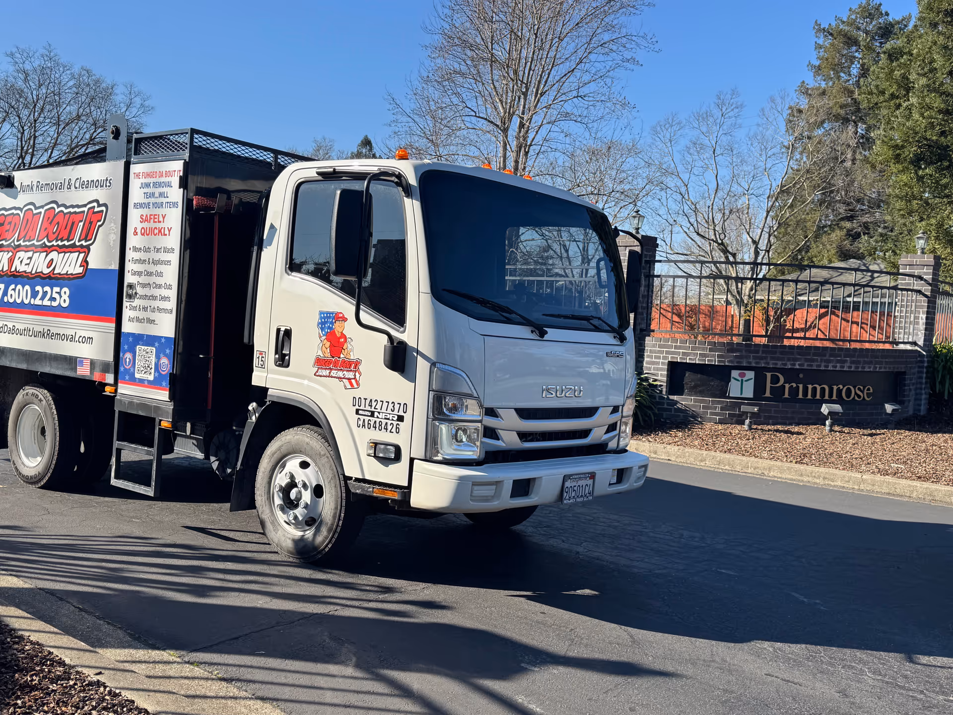 A delivery truck parked in front of Primrose Alzheimer's Living facility entrance.