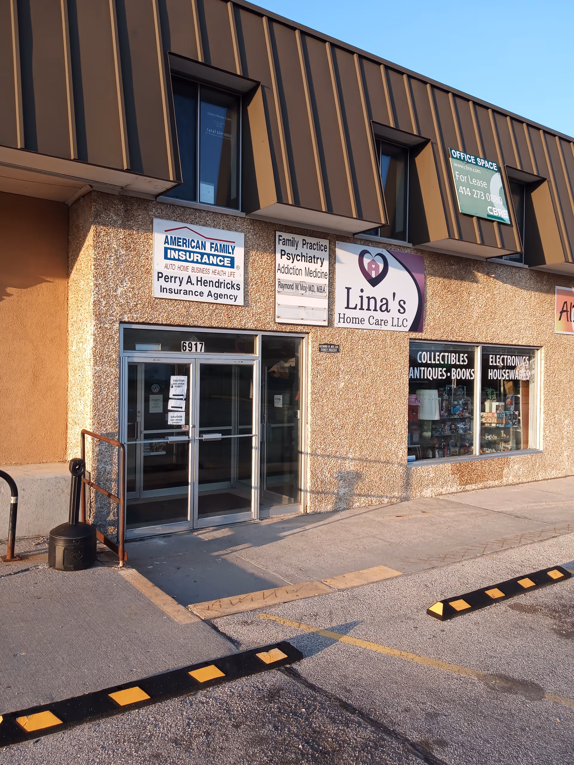 Exterior storefront with Lina's Home Care LLC sign and adjacent shops.