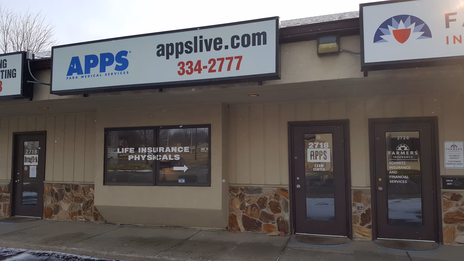 Exterior storefront signs APPS Paramedical Services with windows, doors, and stone accents along the facade.