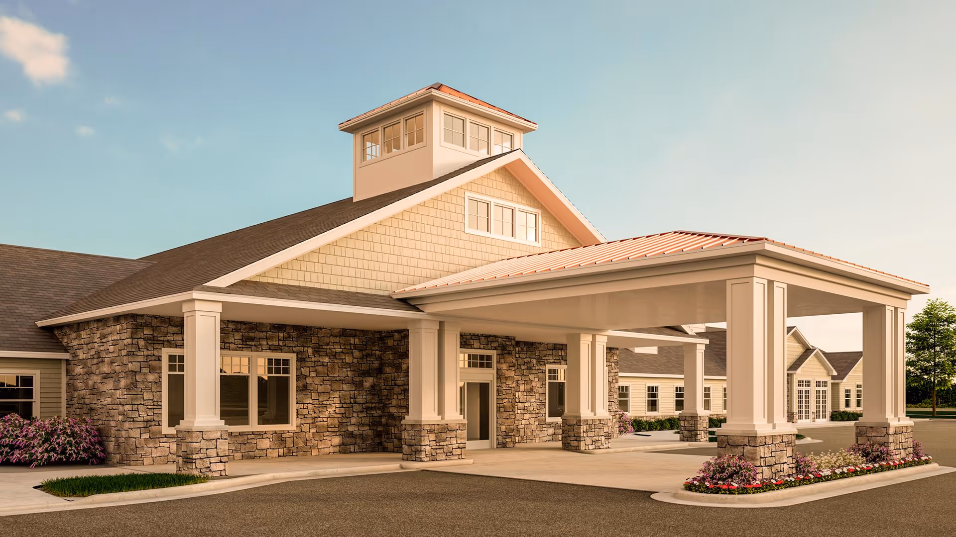 Exterior of Cranberry Park of Milford, with a covered entrance supported by stone columns.