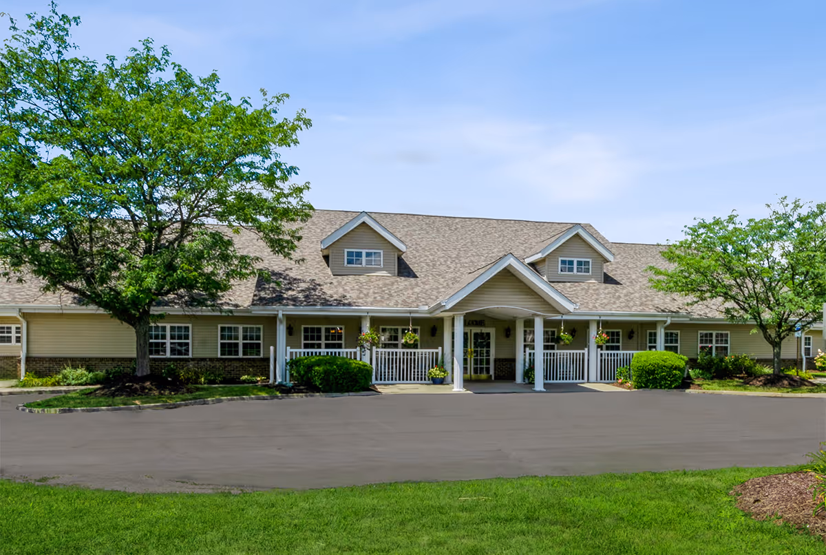 A single story Worthington Place senior living facility with a covered front entrance and manicured landscaping.