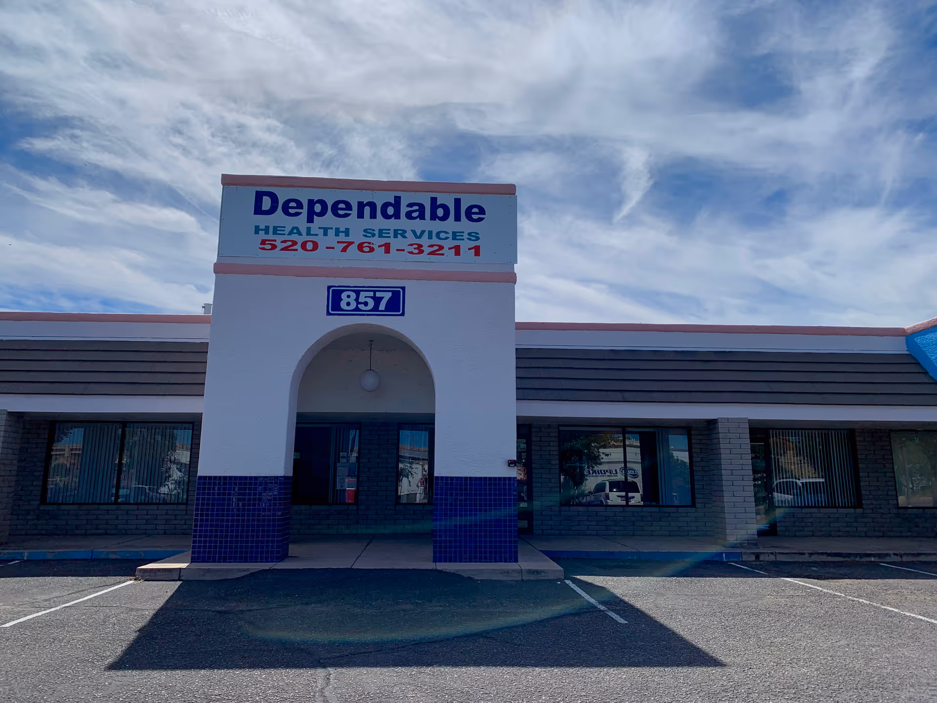 Front exterior of a single-story building with a Dependable Health Services sign.