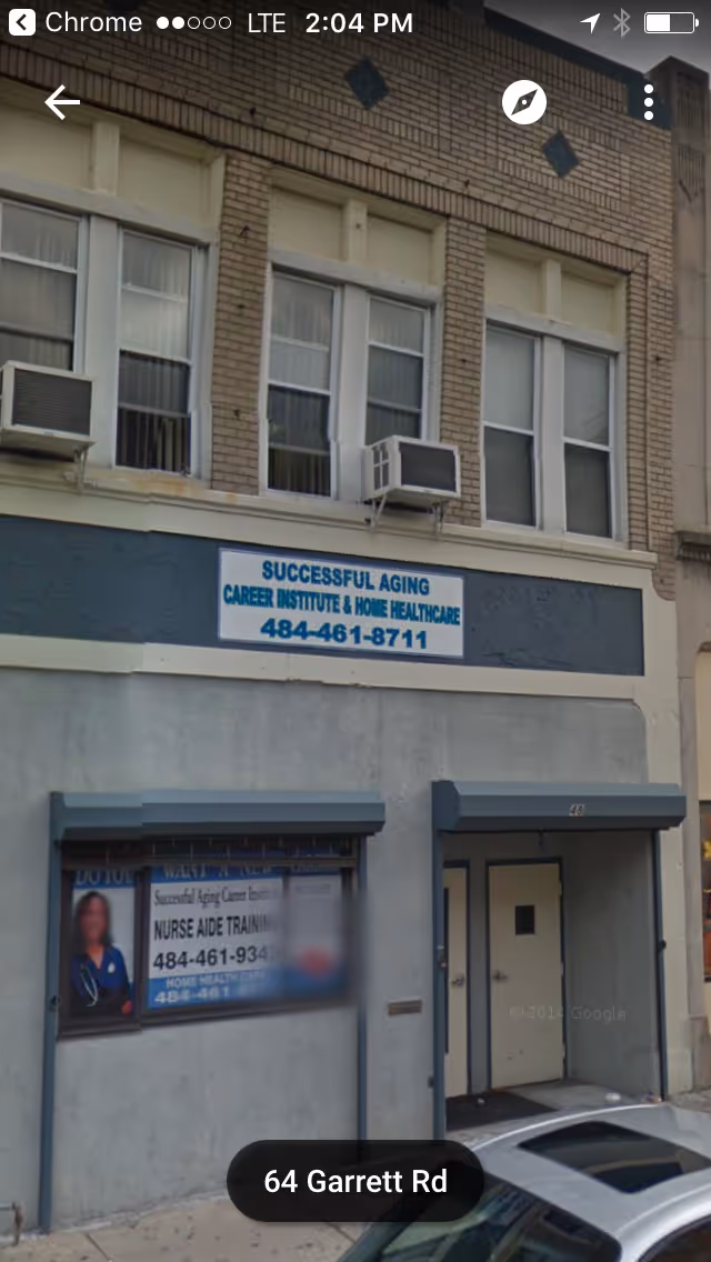 Exterior of a brick building with a sign reading Successful Aging Career Institute & Home Healthcare
