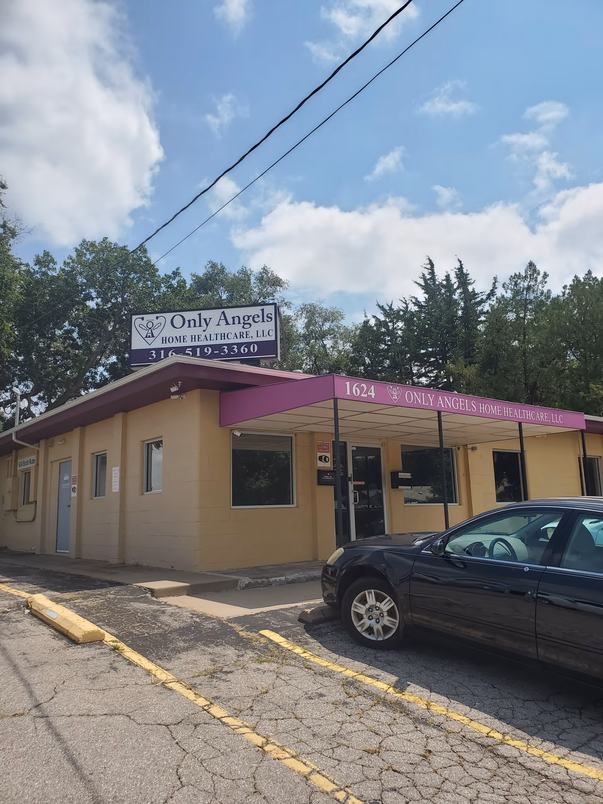 Front view of Only Angels Home Health and Hospice building with purple awning.