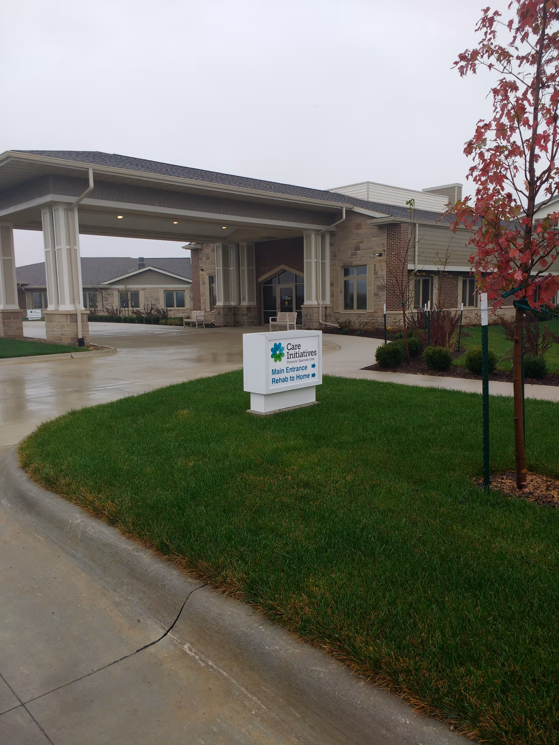 Care Initiatives Hospice Waterloo main entrance sign in front of a brick facility.