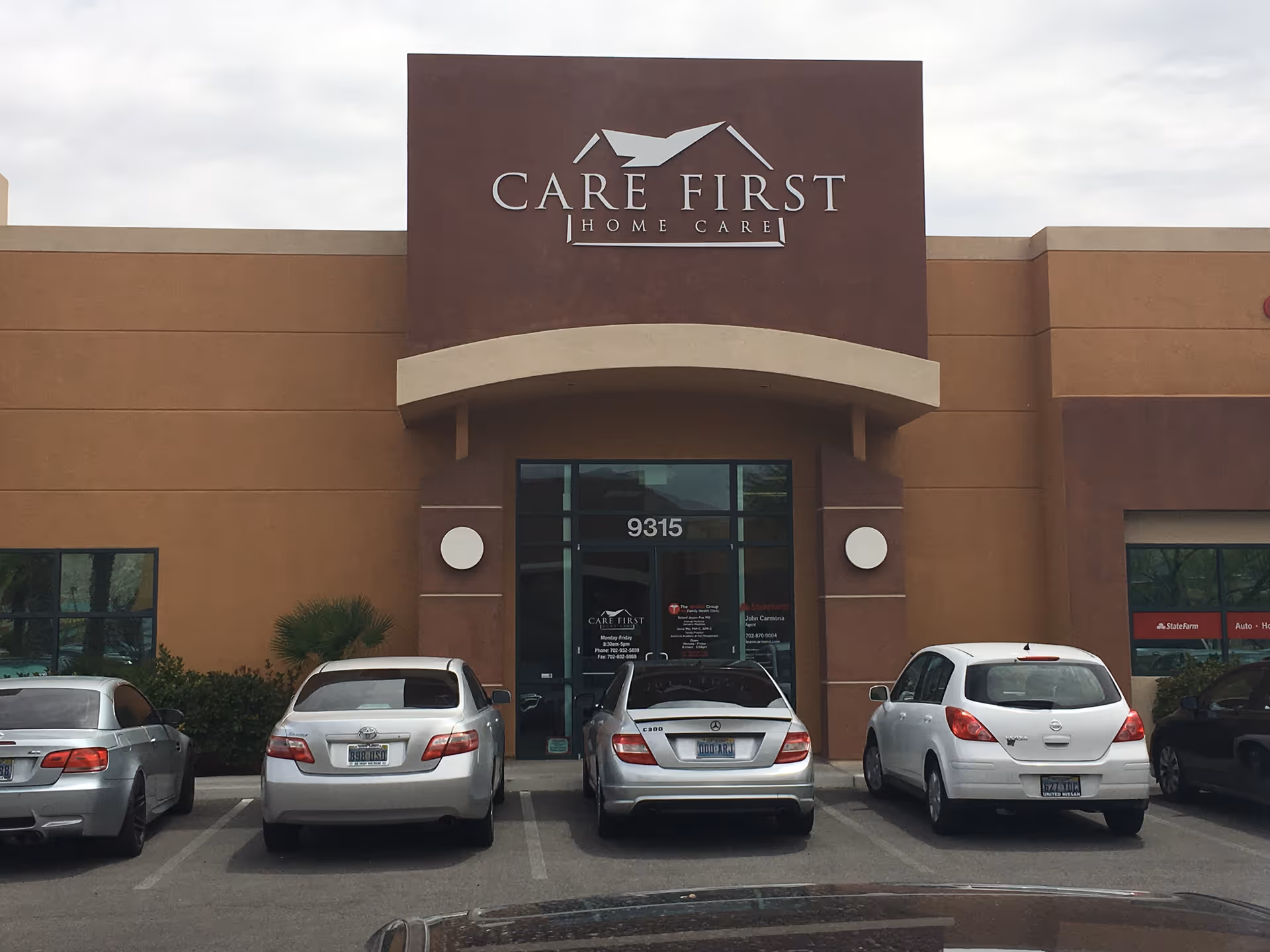 Care First Home Care storefront with brown facade and parked cars in front