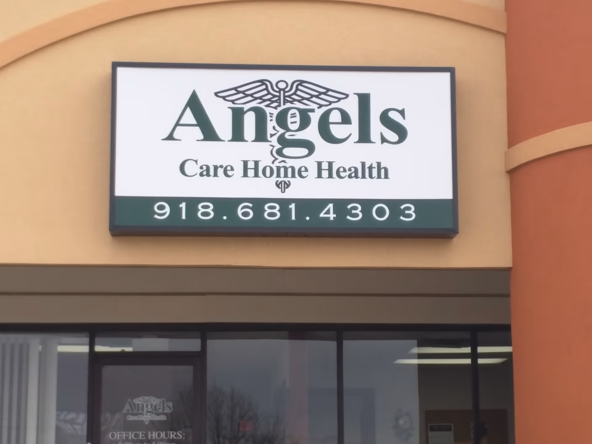 Exterior sign on a beige building reads Angels Care Home Health.