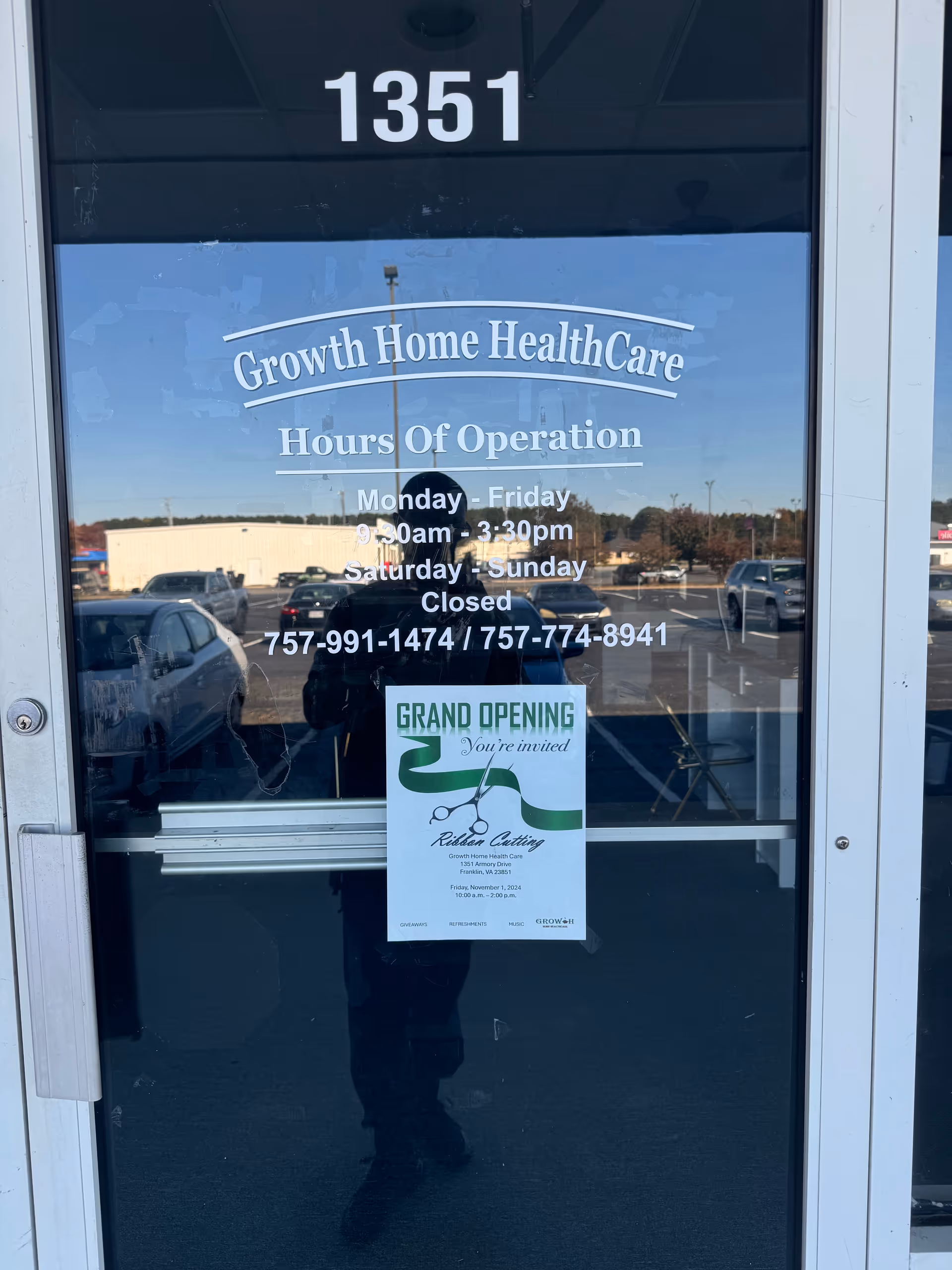 Glass storefront door displays Growth Home HealthCare LLC hours and a Grand Opening flyer.