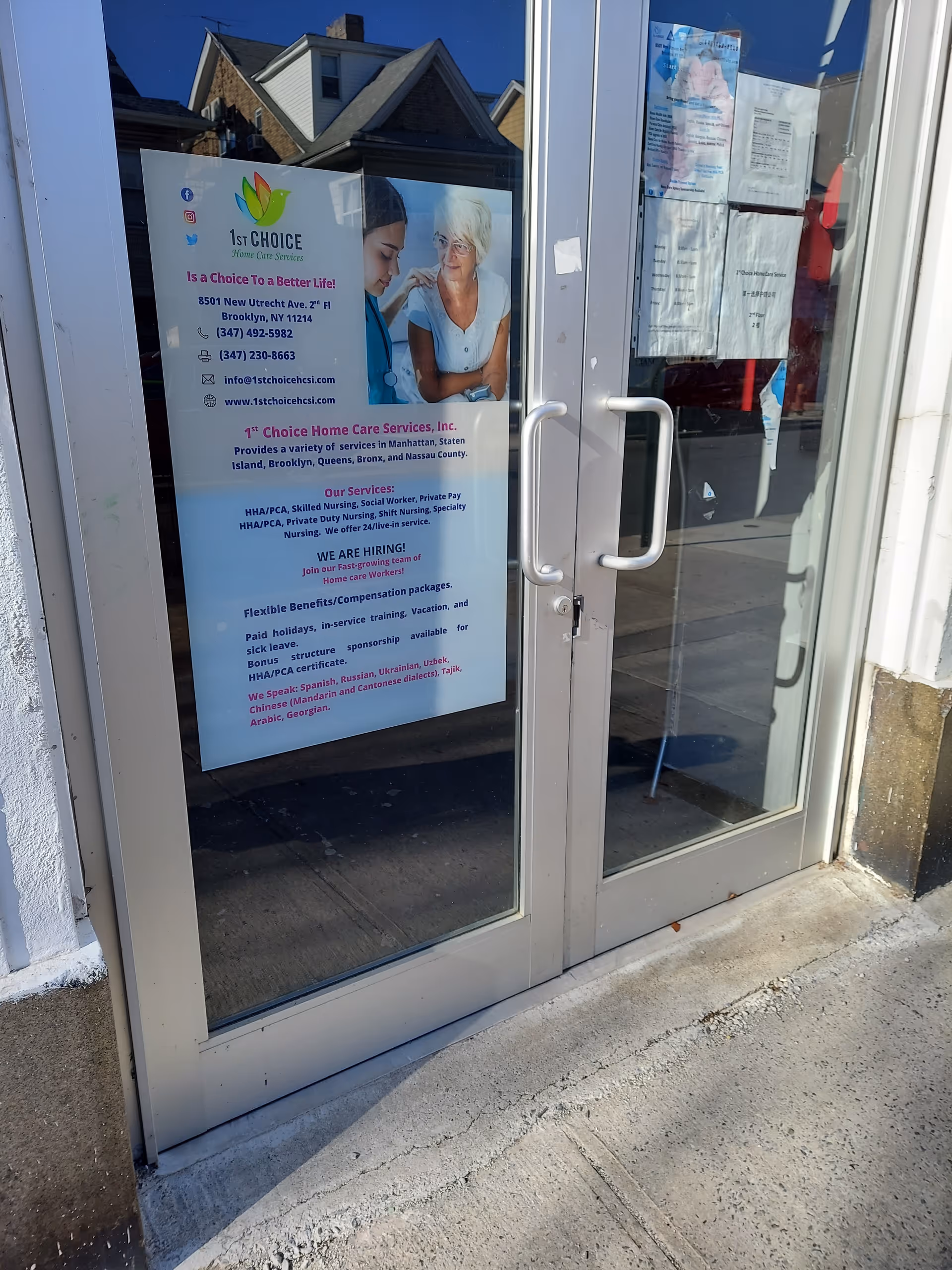 Glass door entrance with a poster advertising 1st Choice Home Care Services.