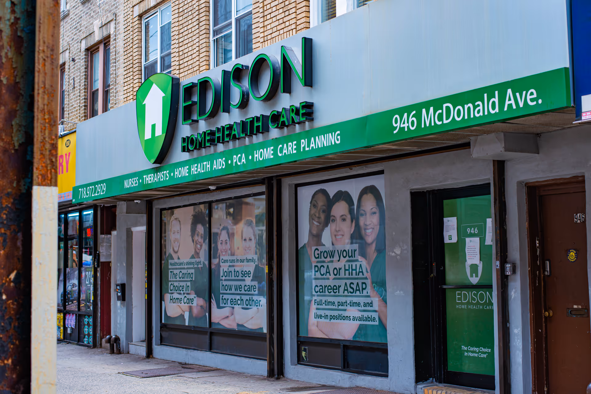 Front of a storefront with Edison Home Health Care signage and window posters.