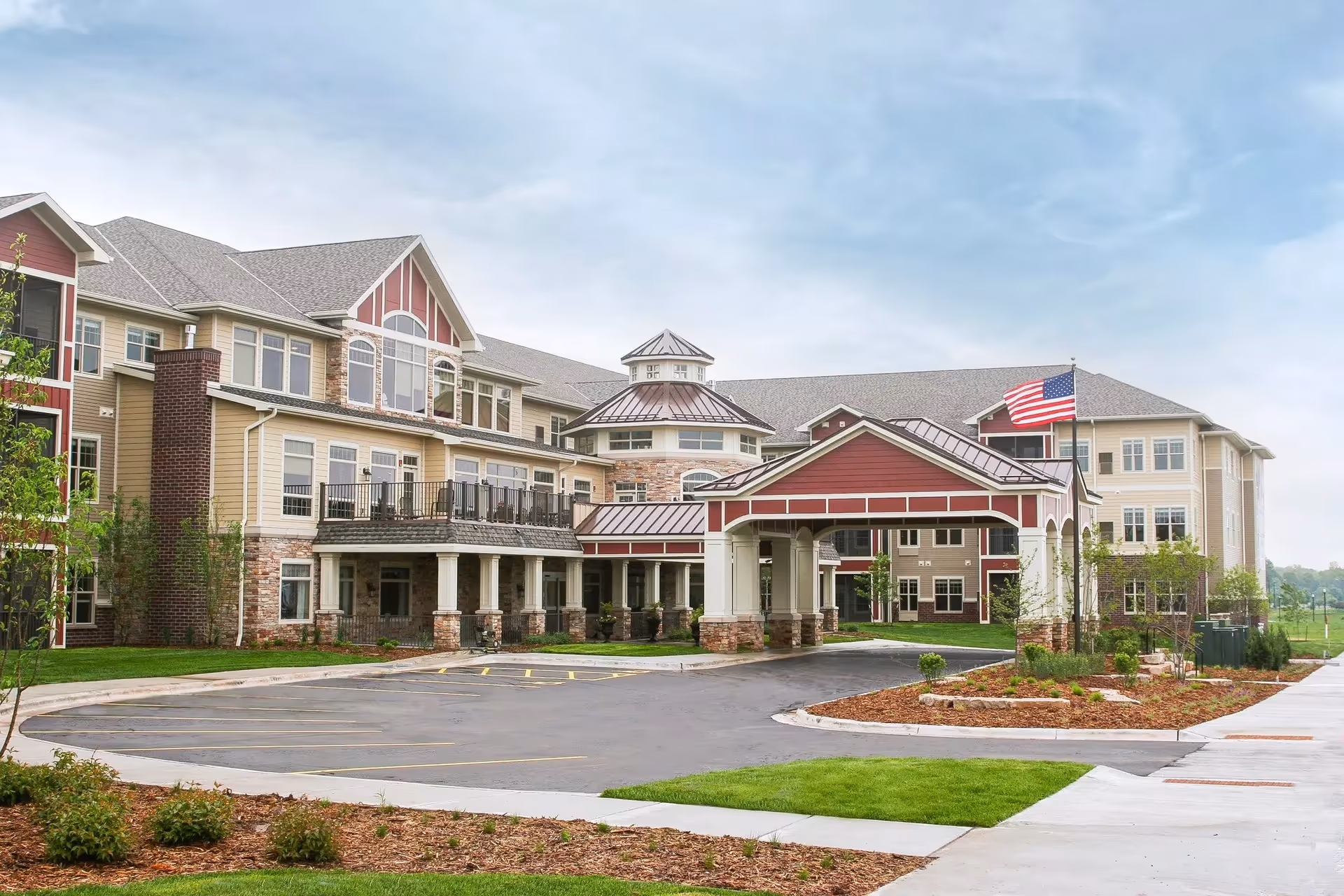 Exterior view of New Perspective Senior Living Howard building with entrance canopy