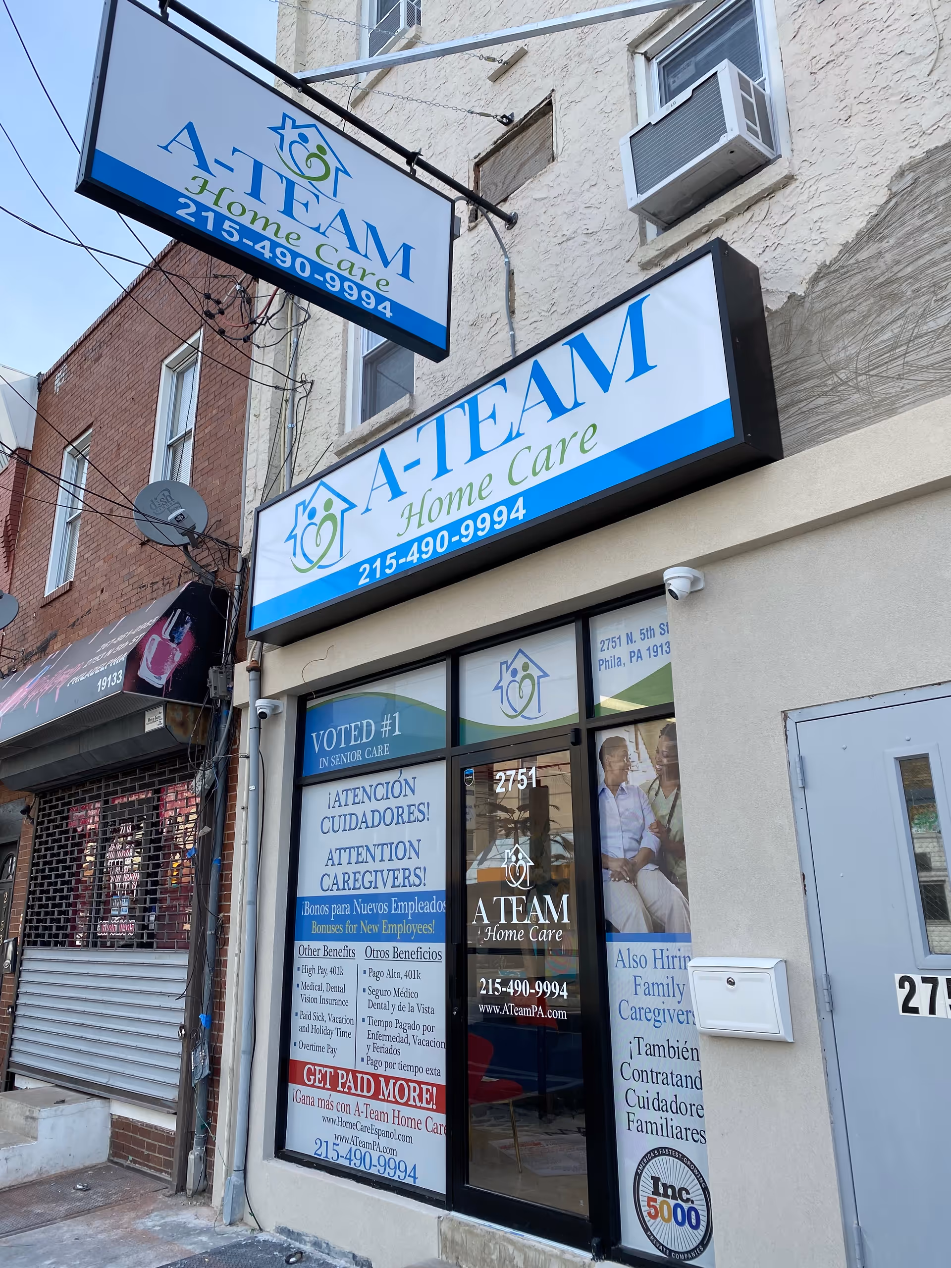 Storefront signage for A-Team Home Care on a building exterior