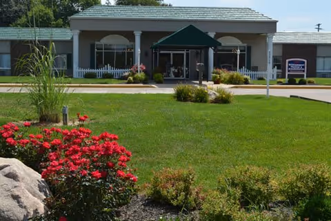 Exterior view of Westview Nursing and Rehabilitation Center entrance with green awning and landscaping.