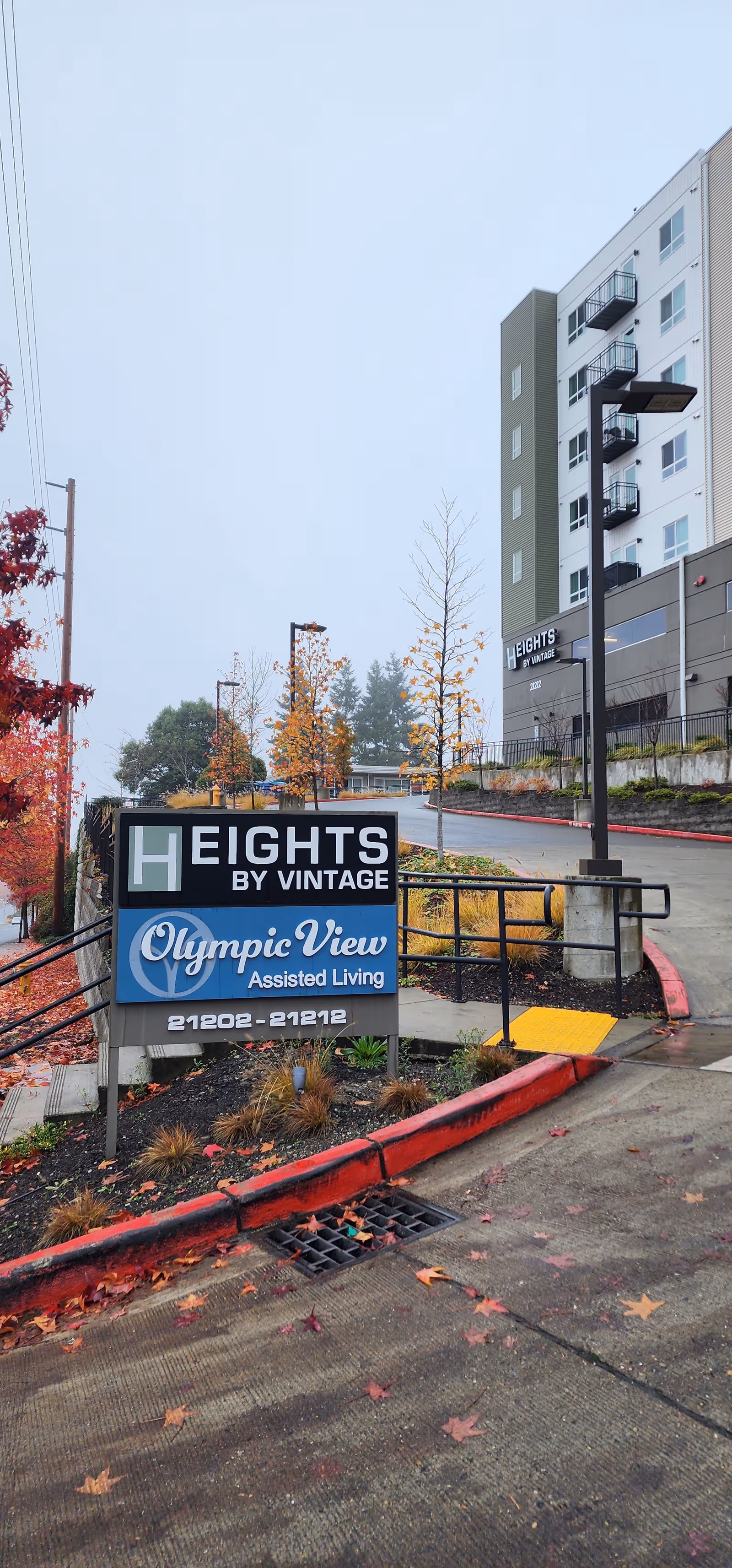 Exterior view of Olympic View Assisted Living sign and building entrance